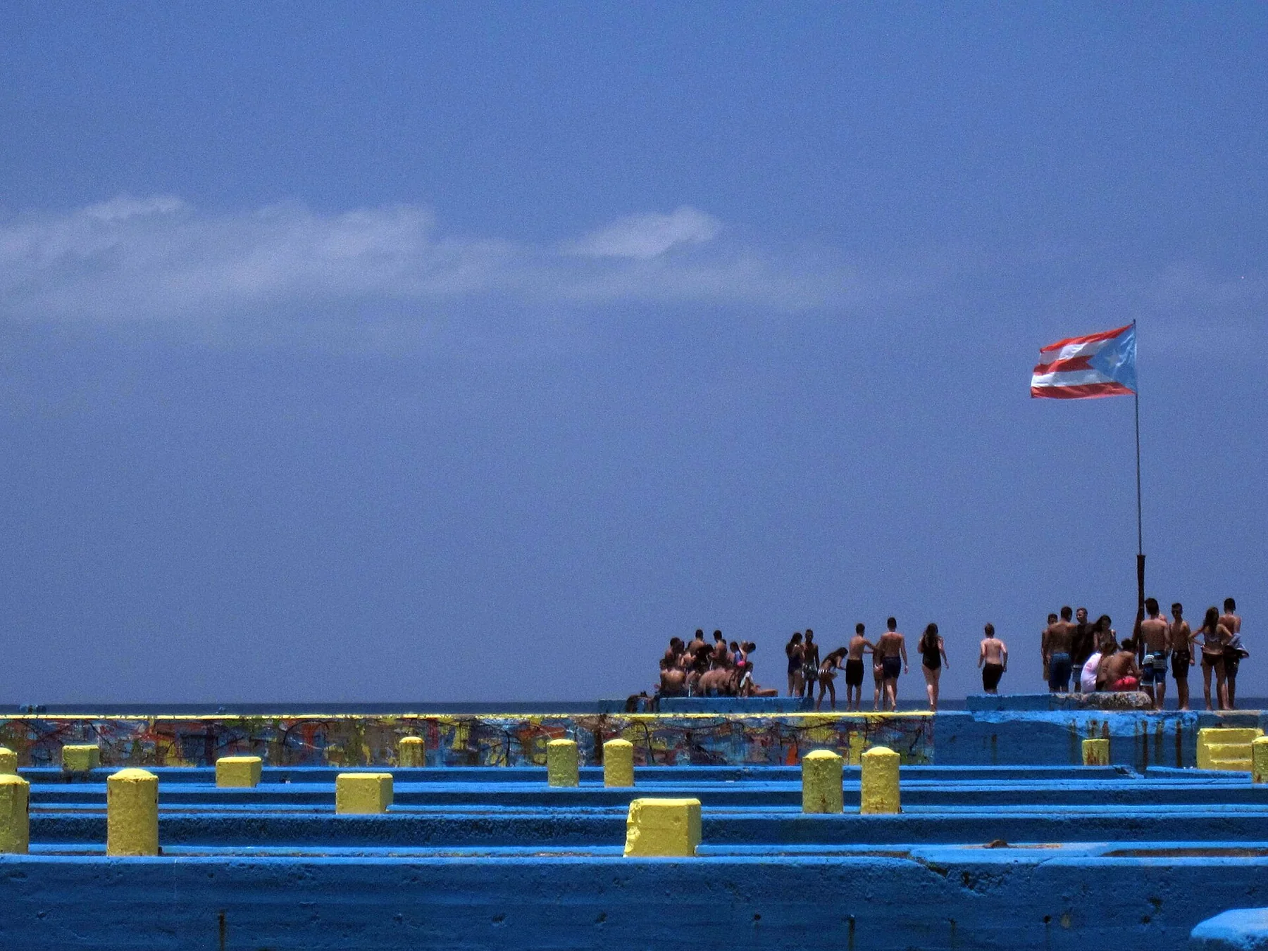 Pier and turquoise water at Crash Boat Beach in Aguadilla, Puerto Rico